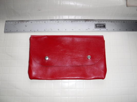 A red clutch bag