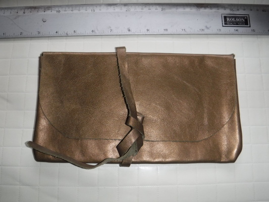 A brown clutch bag